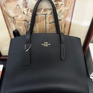 Coach Medium Charlie Carryall in black